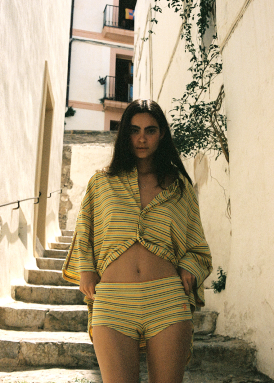 women loose fitting striped matching top and bottoms set.