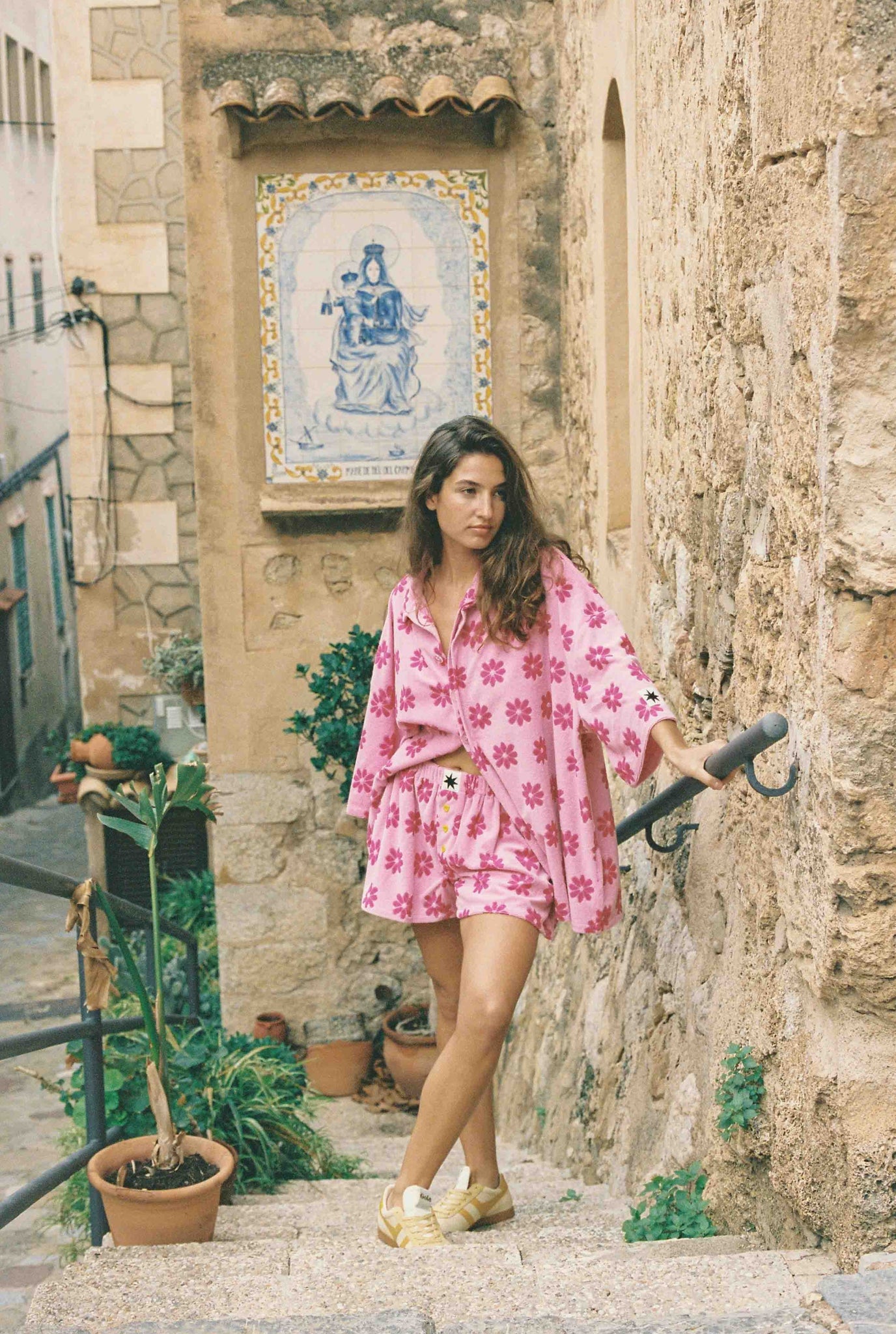 pink daisy print matching top and bottoms oversized fitting beach set. 