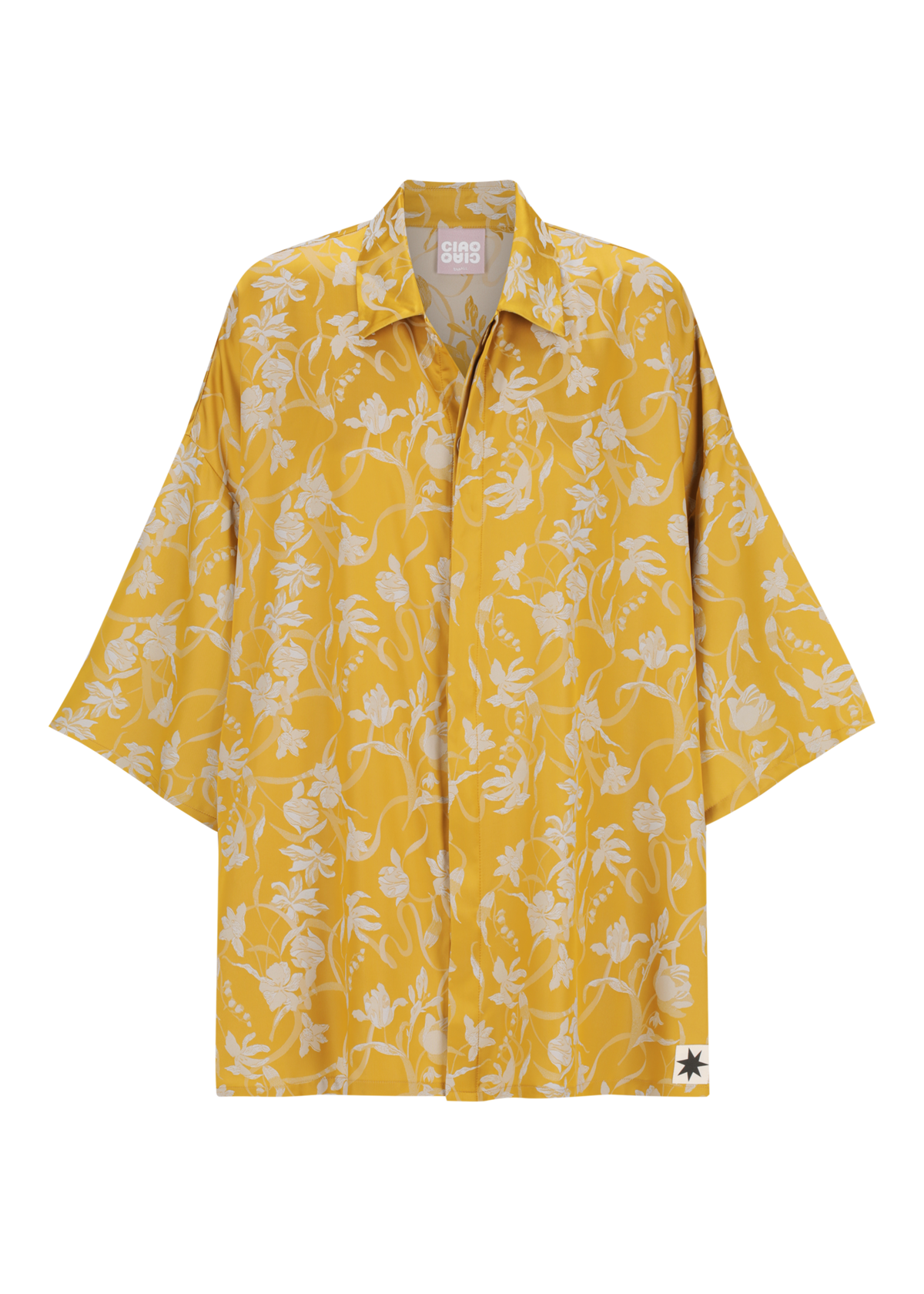 Yellow satin floral shirt on a white background