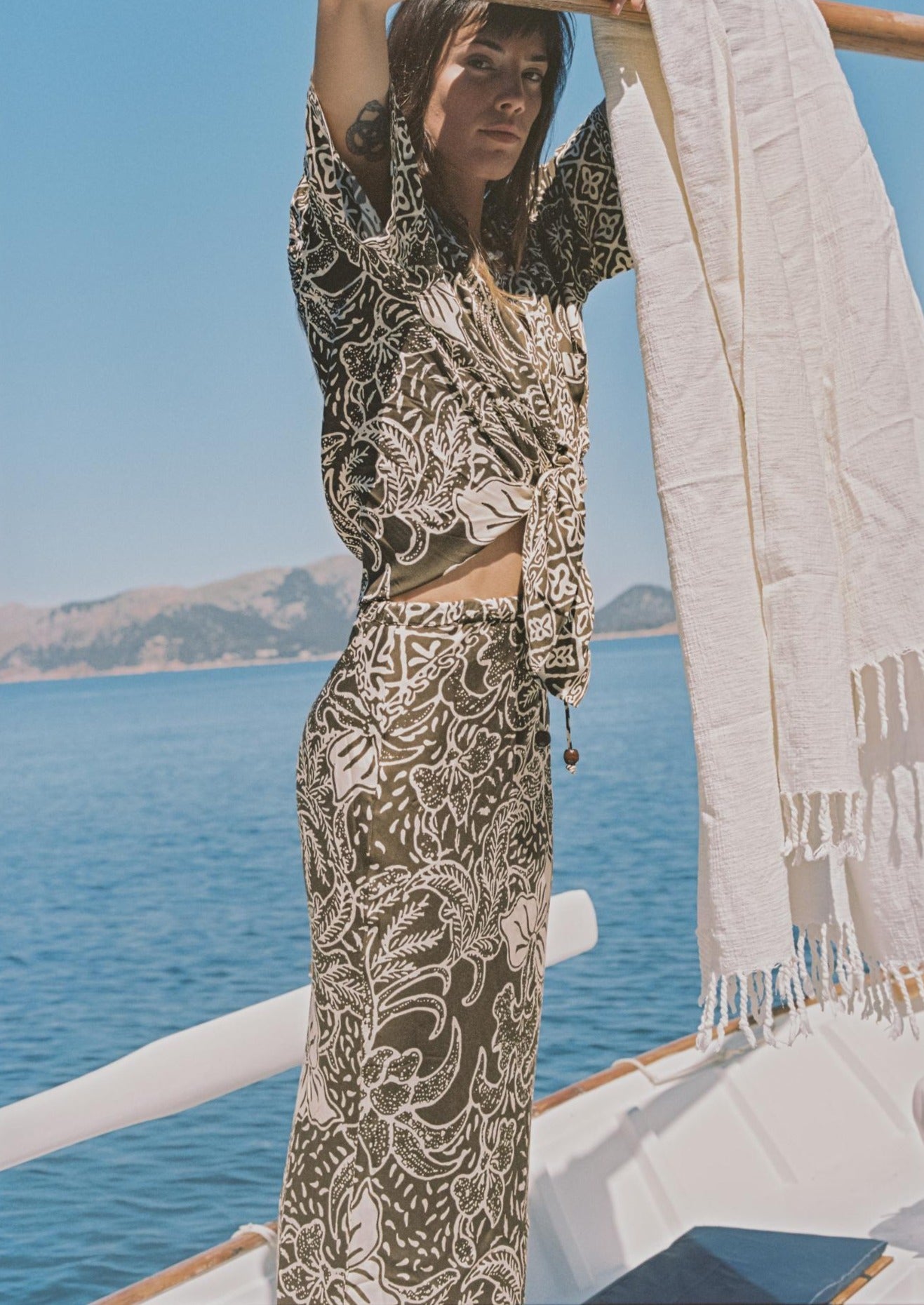 Flowy white and green matching top and skirt set.