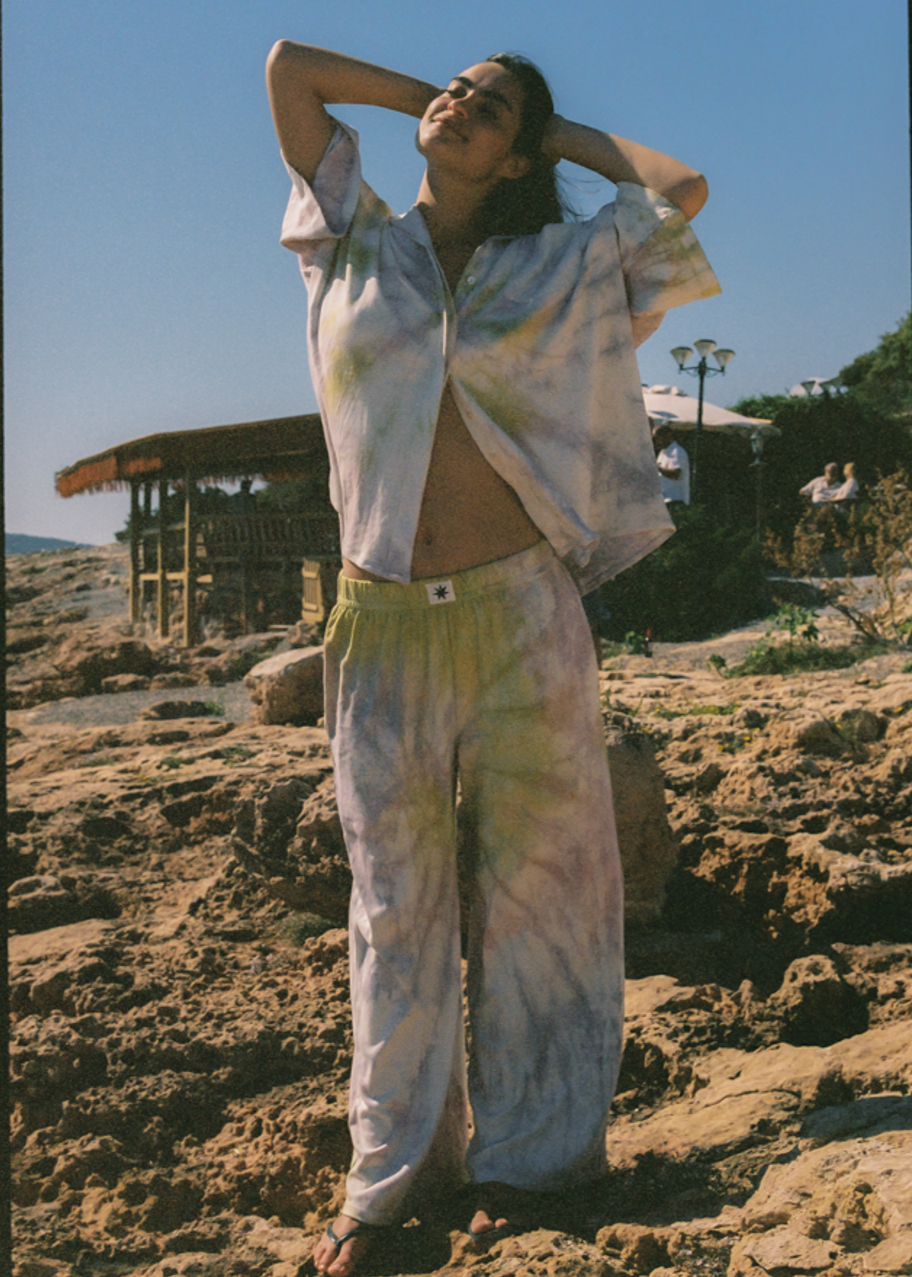 Swirl tie-dye matching button up top with matching tie-dye pants.