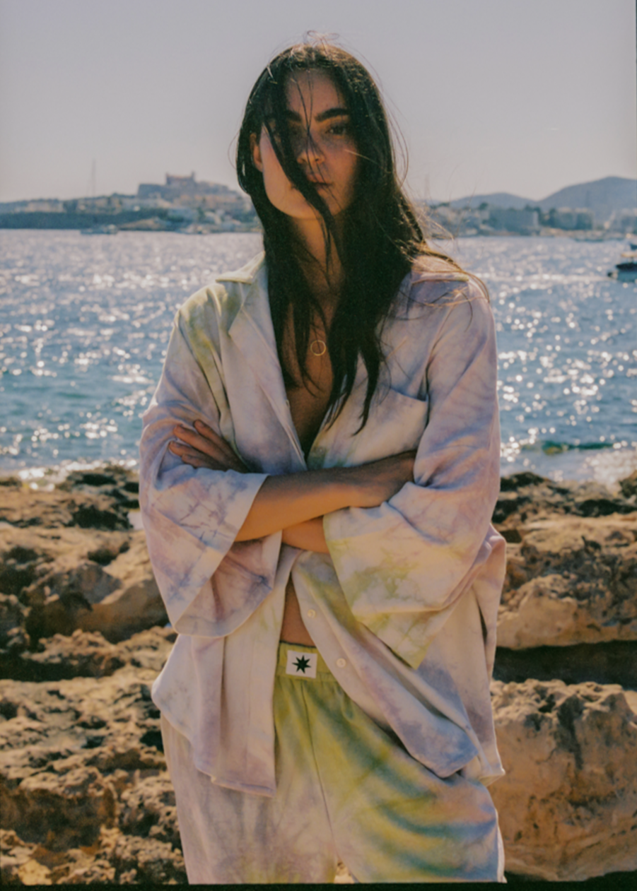 Wearing oversized tie-dye button up shirt with matching tie-dye loose fitting pants